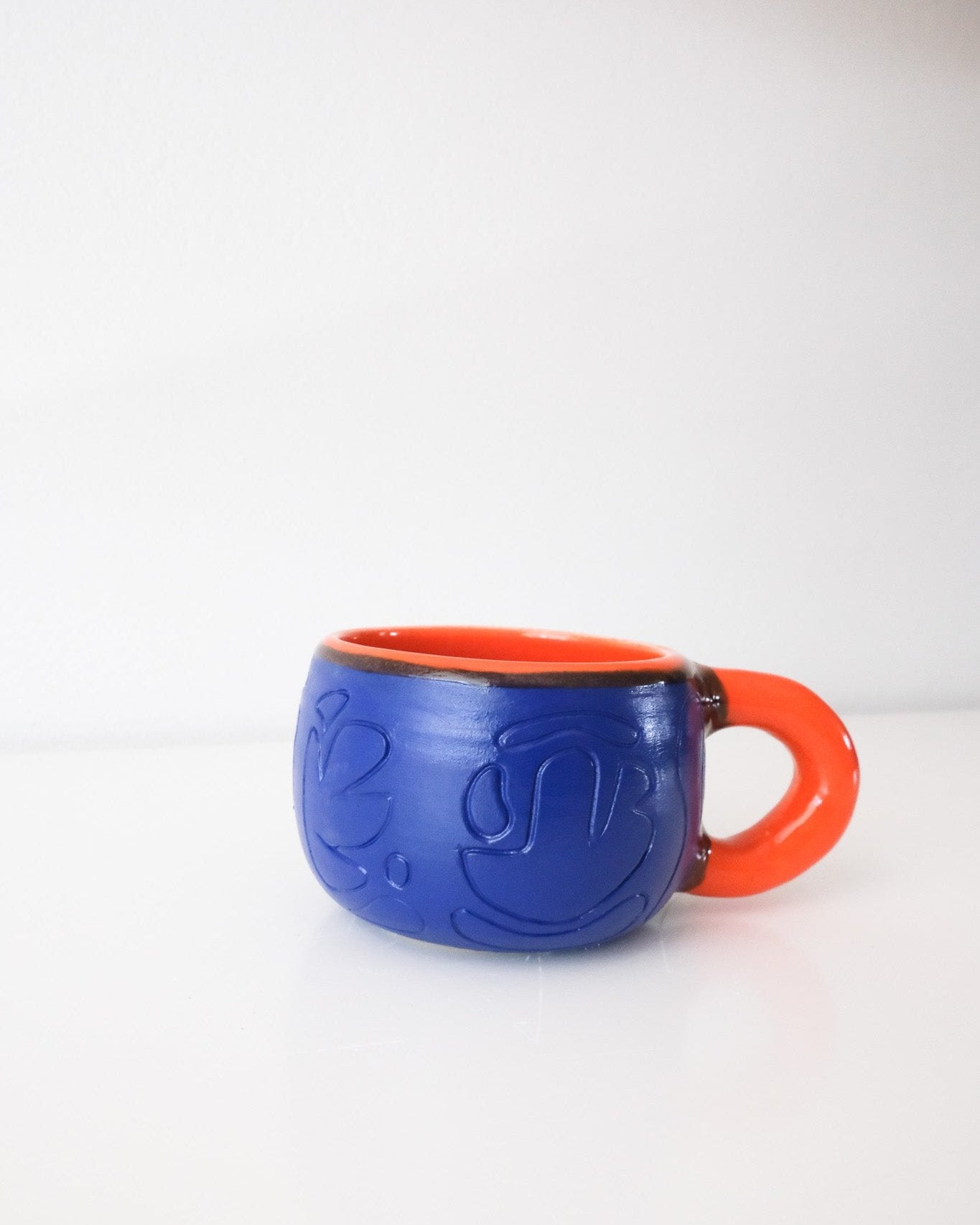 Blue and Tangerine Carved Mug